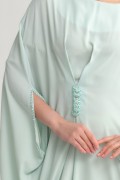 تصميم جلابية واسعة من البروش الخصر باللون التيفاني 